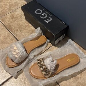 EGO Brown Sandals with Gold Chain Accent